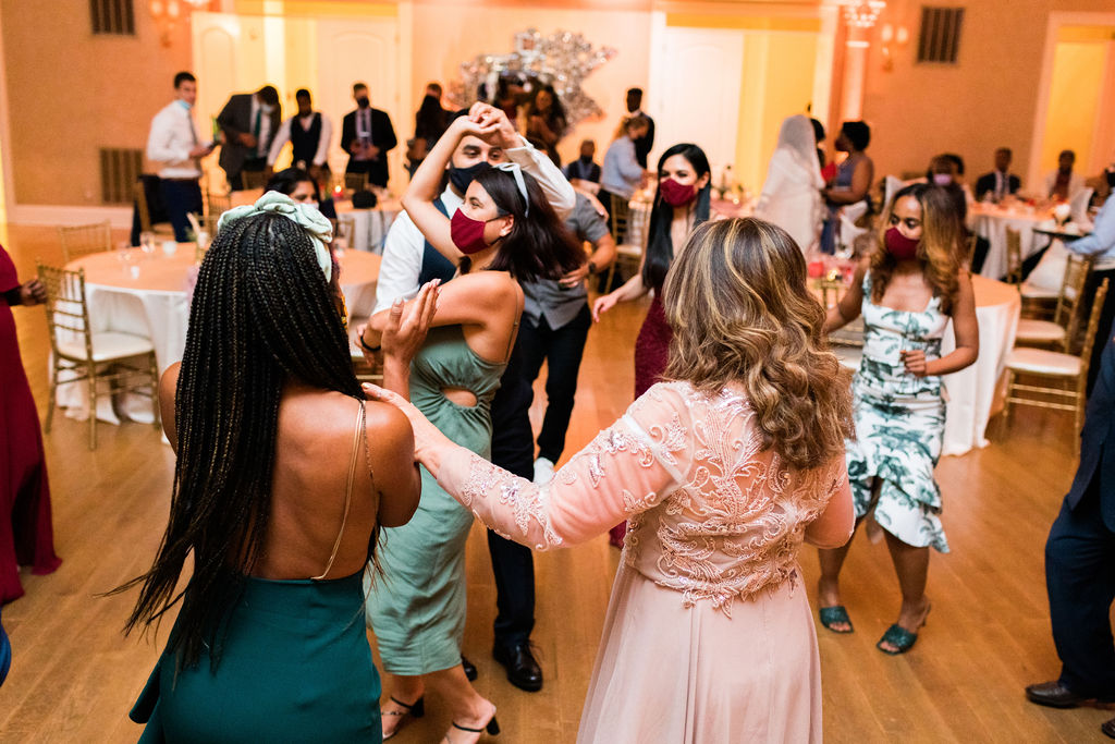wedding guests dancing on dance floor